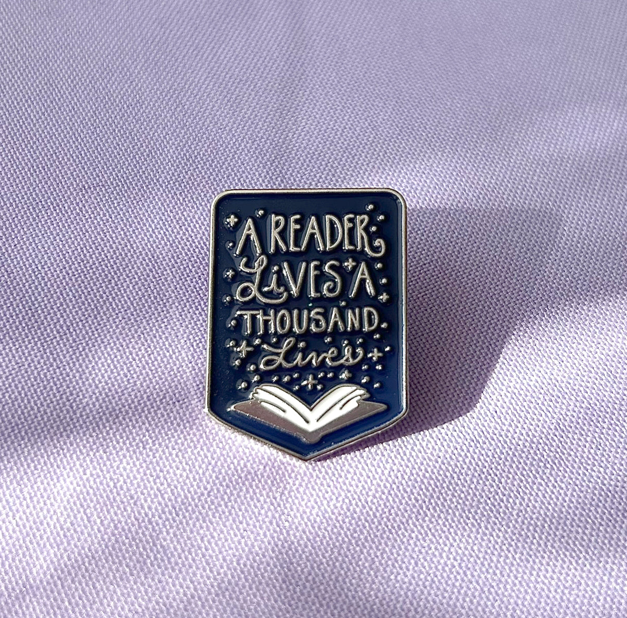 A Reader Lives a Thousand Lives Dragon Enamel Pin